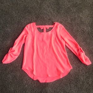 3/4 length coral shirt with bows on the back